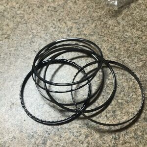 Gun metal bangle bracelets (7 piece).